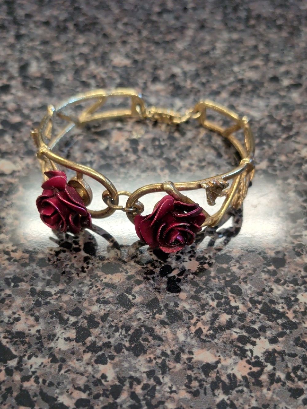 Gold-Tone Bracelet with Burgundy Rose Accents